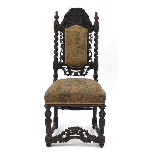 2141 - Antique oak high back chair in the Gothic style carved with acorns, leaves and barley twist supports... 