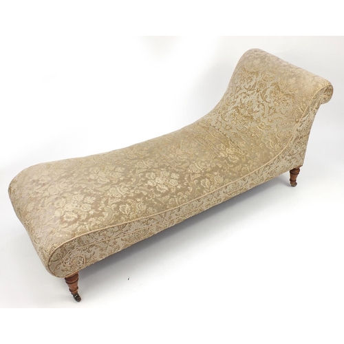 2027 - Victorian oak framed chaise lounge with cream and gold floral upholstery, 180cm long