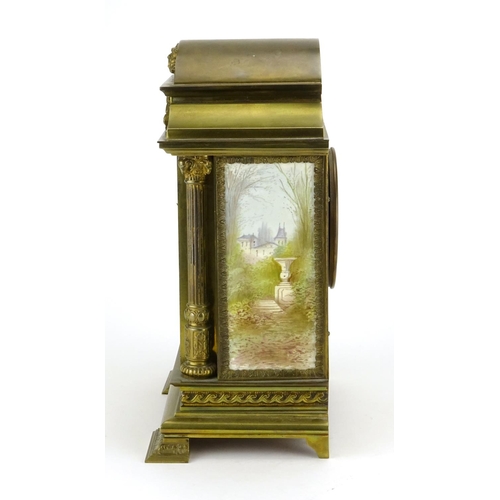 2329 - French brass mantel clock with enamelled panels, hand painted with figures and buildings, the moveme... 