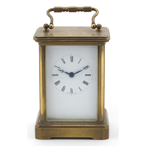 2469 - Brass cased carriage clock with enamelled dial and Roman numerals, 11cm high