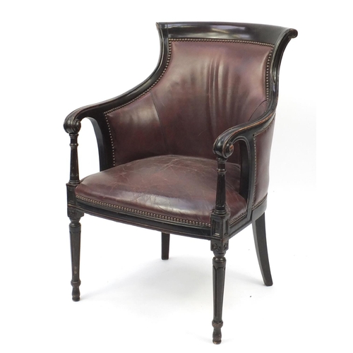 2074 - Mahogany and brown leather library chair on tapering legs, 91cm high
