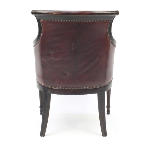 2074 - Mahogany and brown leather library chair on tapering legs, 91cm high