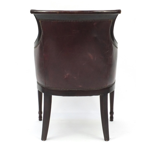 2075 - Mahogany and brown leather library chair on tapering legs, 91cm high