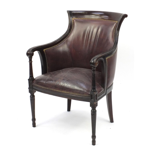 2101 - Mahogany and brown leather library chair on tapering legs, 91cm high