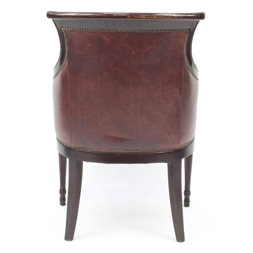 2101 - Mahogany and brown leather library chair on tapering legs, 91cm high