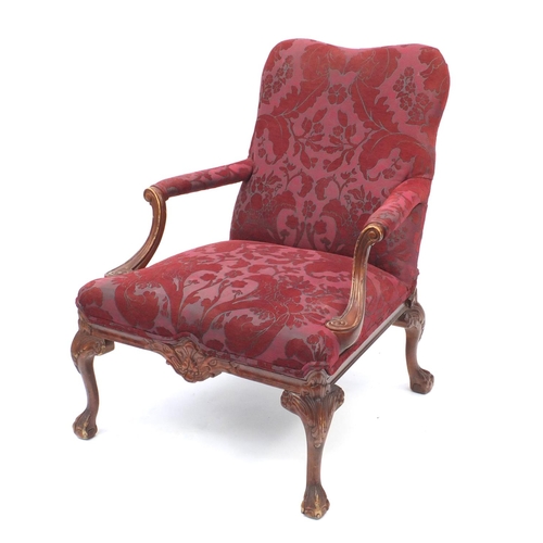2039 - Mahogany framed open armchair with scroll arms, ball and claw feet and red floral upholstery, 93cm h... 
