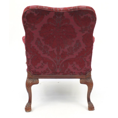 2039 - Mahogany framed open armchair with scroll arms, ball and claw feet and red floral upholstery, 93cm h... 