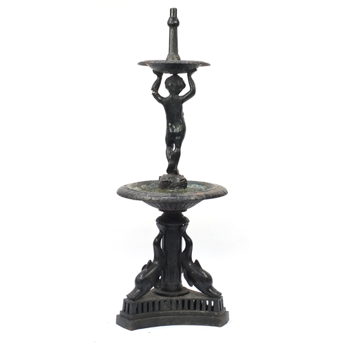 2008 - Victorian cast iron cherub water fountain with dolphin supports, 170cm high