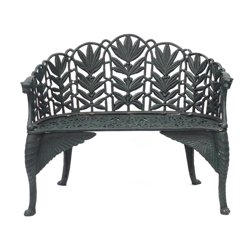 2089 - Heavy green painted iron garden bench with griffin legs, 86cm H x 105cm W x 48cm D