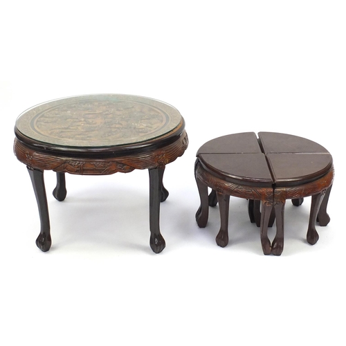 2092 - Chinese circular hardwood nest of five tables, the largest carved with two dragons chasing a flaming... 