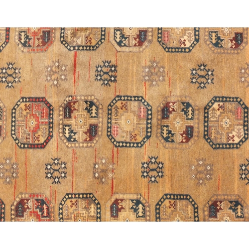 2023 - Rectangular Afghan Bokhara rug, the central field having a repeat floral design within corresponding... 