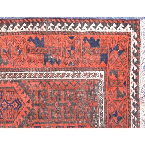 2150 - Rectangular Persian Baluch red ground rug, 162cm x 93cm