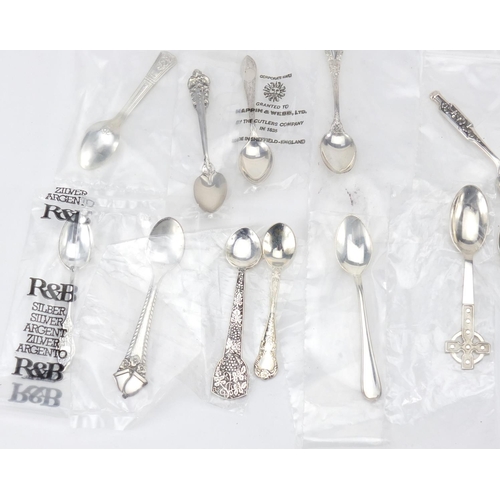 2854 - Twenty three miniature silver spoons including George Jenson and David Andersen, some in sealed pack... 