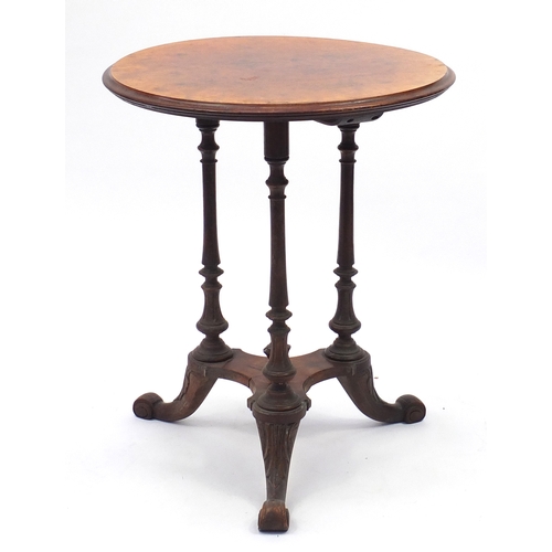 2078 - Circular burr walnut occasional table, raised on three turned tapering legs, trefoil platform and sc... 