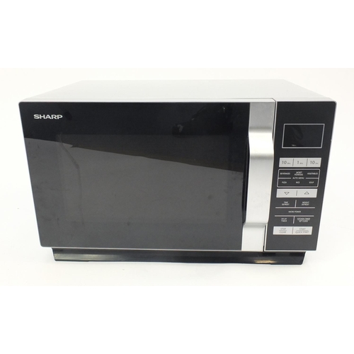 100 - Silver Sharp microwave, 48cm wide