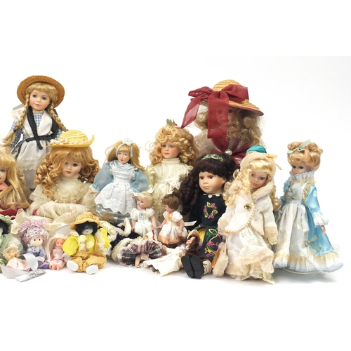 822 - Large collection of mostly bisque head collectors dolls on stands