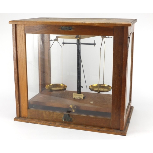 776 - Set of Victor apothecary scales with an oak case, retailed by Jackson & Co