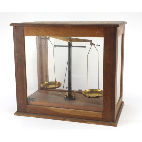 776 - Set of Victor apothecary scales with an oak case, retailed by Jackson & Co