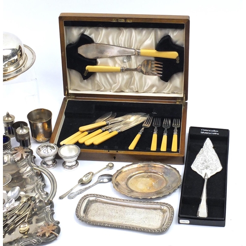 266 - Silver plate including a twin handled tray, muffin dish, cutlery, sauce boats and cruets
