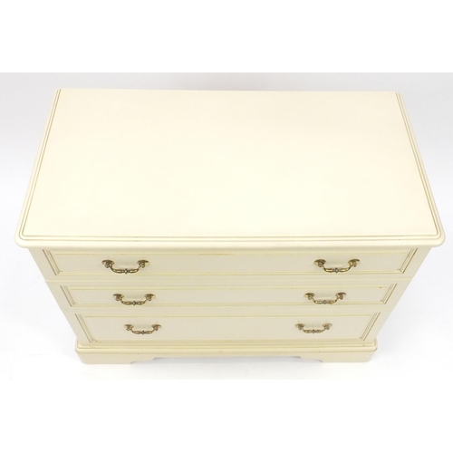 20 - Cream painted wood three drawer chest, 71cm H x 90cm W x 46cm D