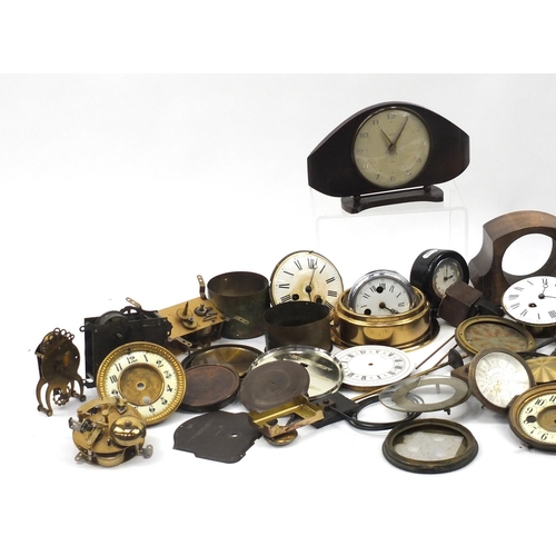 827 - Box of assorted clock faces, movements and parts