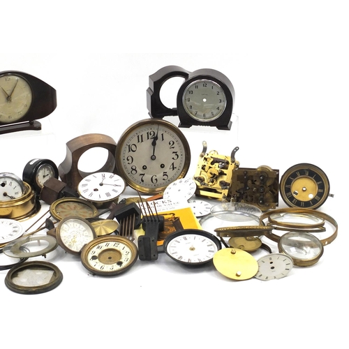 827 - Box of assorted clock faces, movements and parts