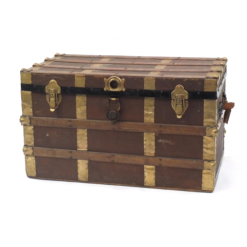 8 - Large metal bound wooden travelling trunk with brass fittings, 51cm H x 87cm W x 47cm D