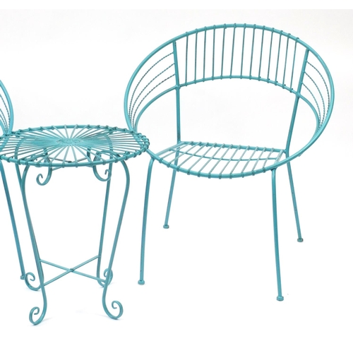 23 - Pair of turquoise painted metal tub chairs and matching side table