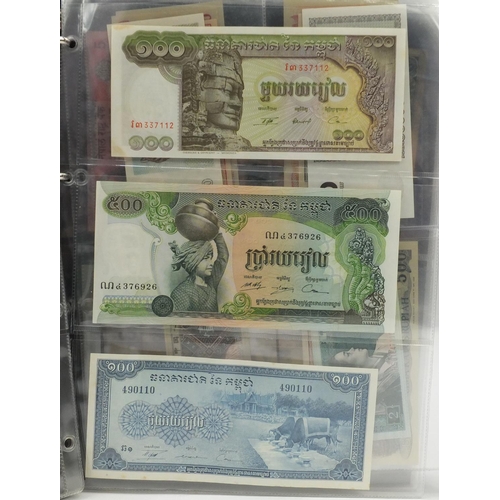 839 - World banknotes arranged in albums including Great Britain and China