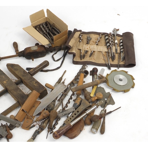 833 - Vintage wood working tools including drill bits, planes and hammers