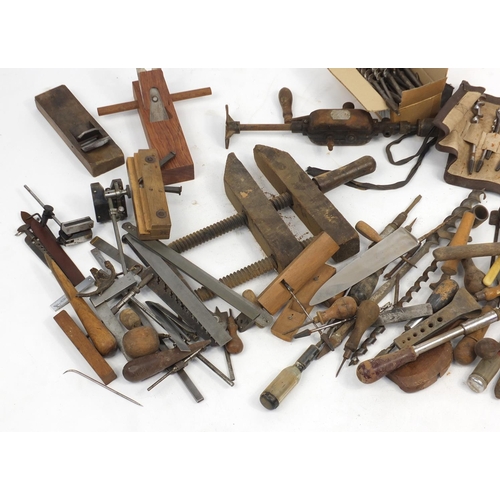 833 - Vintage wood working tools including drill bits, planes and hammers