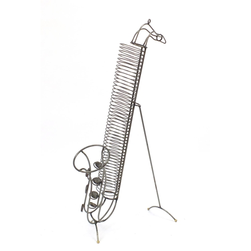 27 - Modernist saxophone CD rack, 109cm high