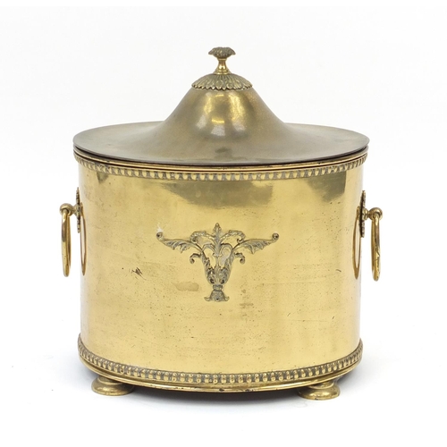 828 - Regency style brass four footed coal box with twin handles and liner, 44cm high