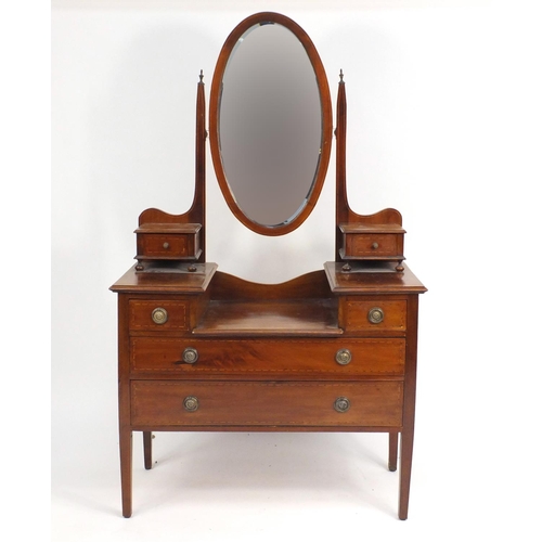 13 - Edwardian inlaid mahogany dressing table with swing mirror and two jewellery drawers a above an arra... 