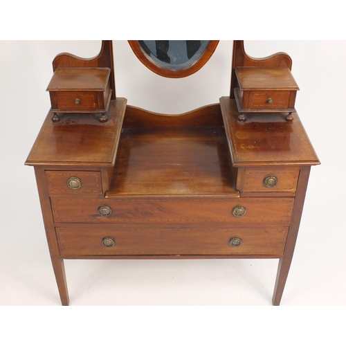 13 - Edwardian inlaid mahogany dressing table with swing mirror and two jewellery drawers a above an arra... 