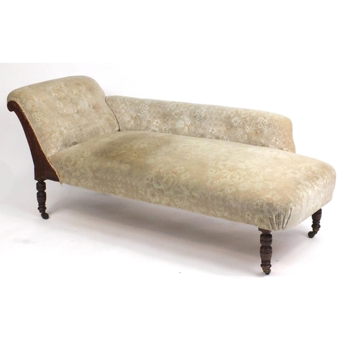 15 - Victorian walnut chaise lounge with carved decoration cream floral upholstery, 160cm in length