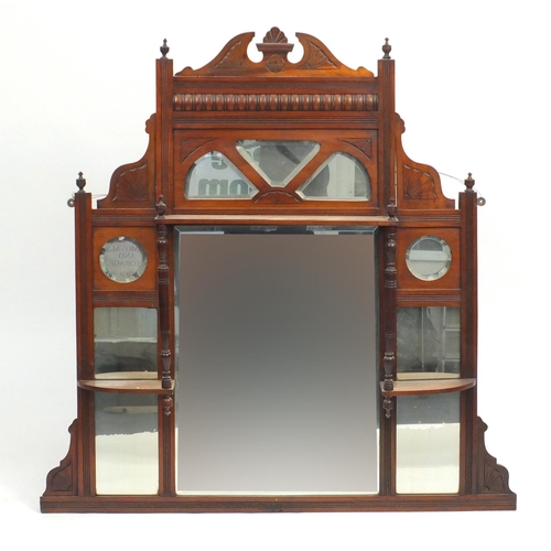 7 - Edwardian walnut over mantel mirror with bevelled glass and three shelves, 104cm H x 106cm W
