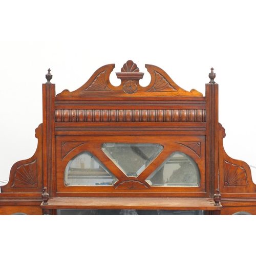 7 - Edwardian walnut over mantel mirror with bevelled glass and three shelves, 104cm H x 106cm W