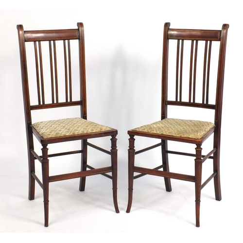 157 - Pair of Edwardian inlaid mahogany occasional chairs raised on tapering out swept feet, 93cm high