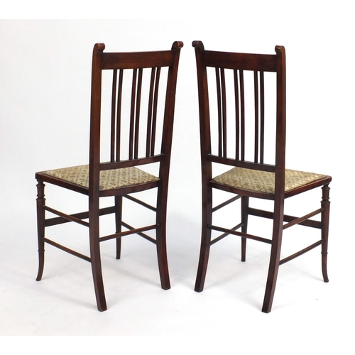 157 - Pair of Edwardian inlaid mahogany occasional chairs raised on tapering out swept feet, 93cm high