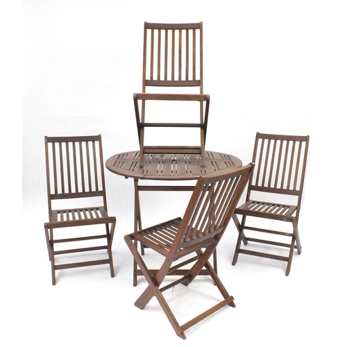 5 - Folding teak garden table and four chairs