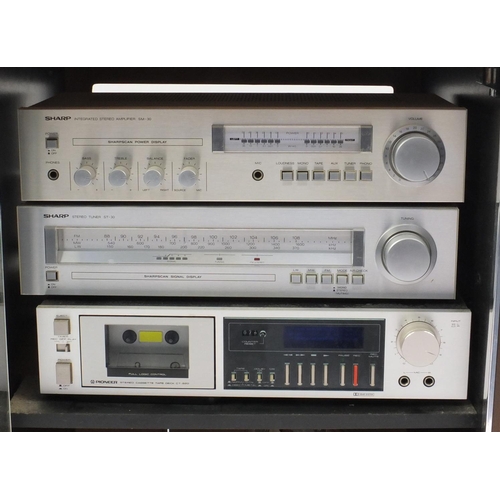 70 - Hi-fi separates comprising Sharp SM-30 stereo amplifier, Sharp ST-30 stereo tuner, Pioneer CT-520 st... 