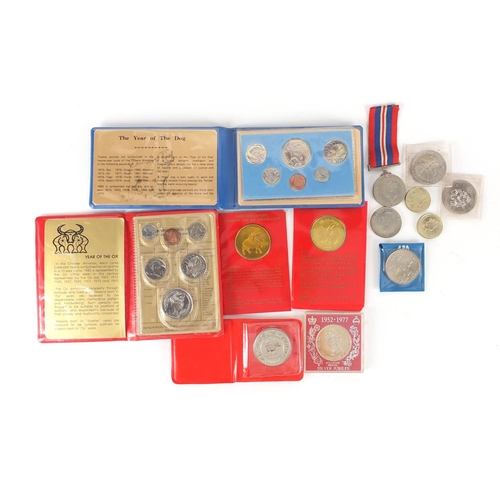 665 - British and World coins including five pound and two pound coins and a British Military World War II... 
