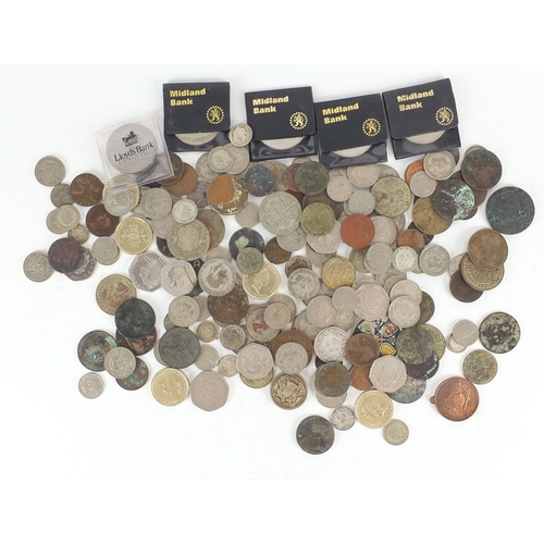 656 - Antique and later British and World coinage including 1914 two franc, an enamelled 1953 five shillin... 