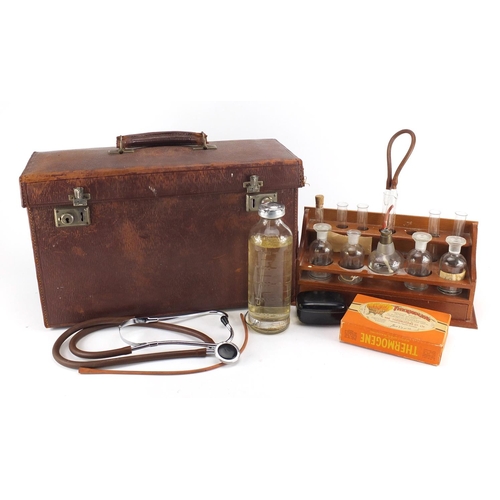 819 - Medical equipment including a leather travelling case and a rack with bottles and test tubes, the la... 