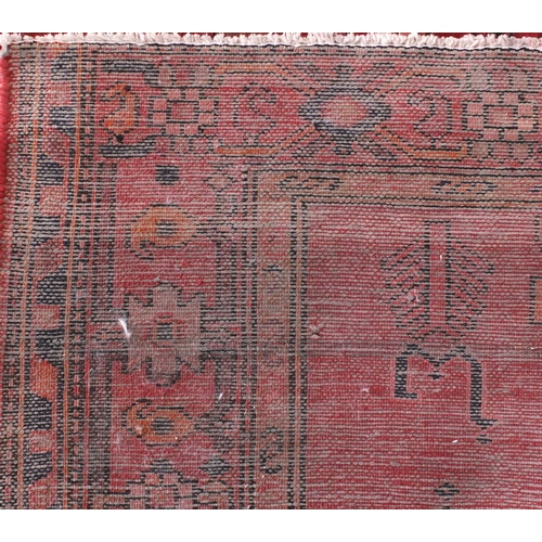 40 - Rectangular Persian Hamadan rug, having an all over geometric design onto predominantly red and blue... 