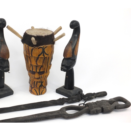 818 - African carved wood items including a pair of busts and drum