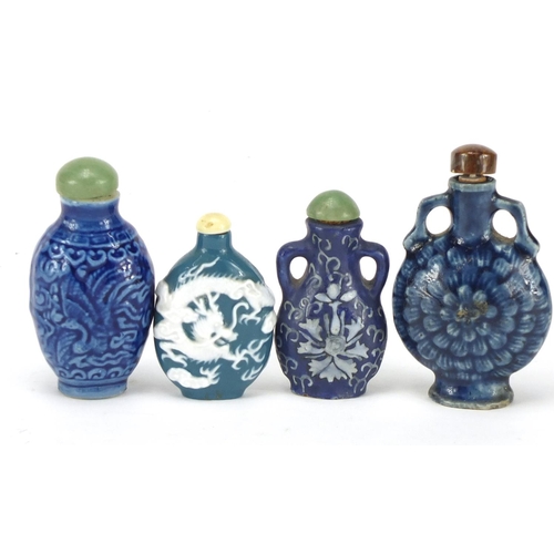 674 - Five Chinese porcelain snuff bottles with stoppers, the largest 8cm high