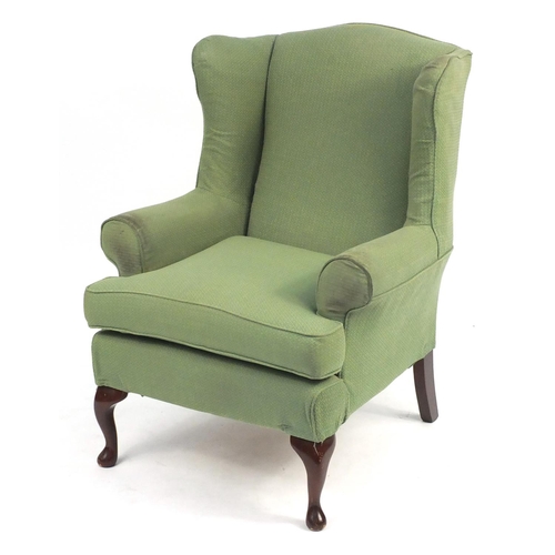 164 - Mahogany framed wingback armchair, with green and gold upholstery, 107cm high