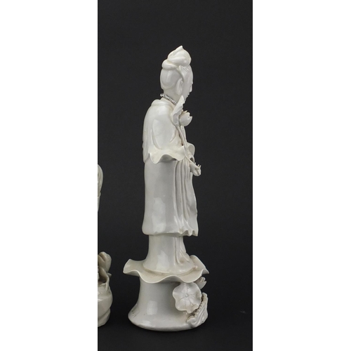164 - Two Chinese blanc de chine of Guanyin and an example of a monk, the largest 38cm high